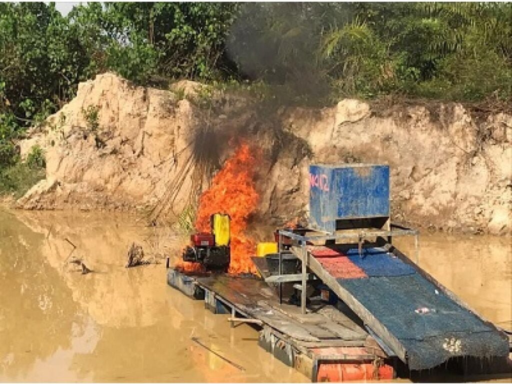 Illegal mining equipment set ablaze