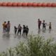 floating barrier on the Rio Grande